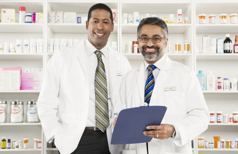 two pharmacist smiling