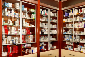 different types of medicine in a cabinet